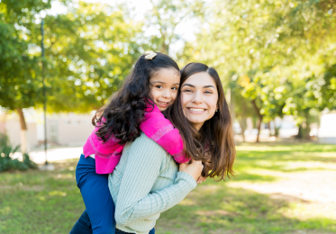 Mother and daughter in the park